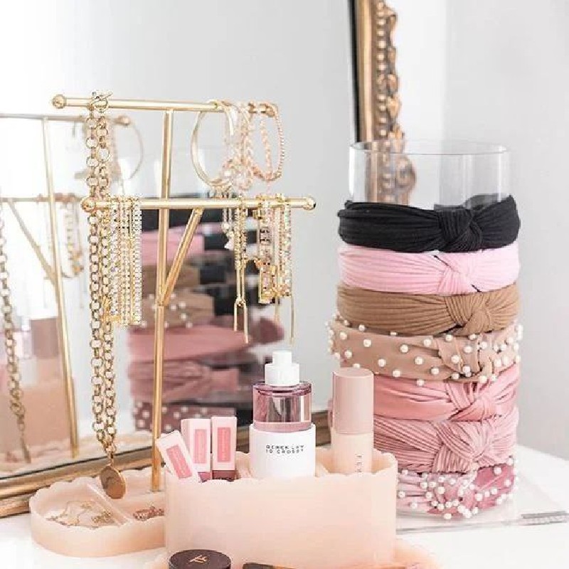 Two women in striped dresses